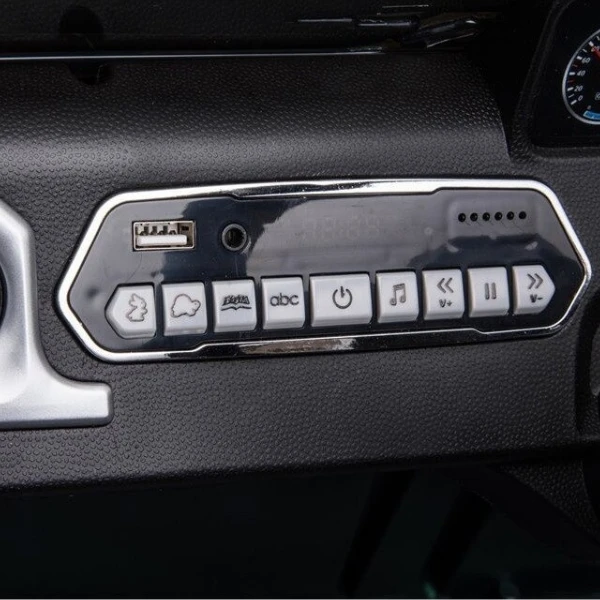 Mașinuță mercedes-benz g 500, baterie 12v7ah, 2 motoare de 35w, roti eva, scaune din piele 11