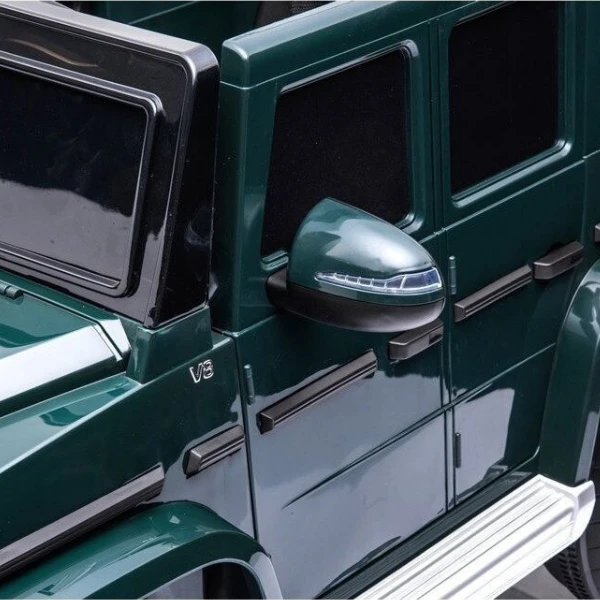 Mașinuță mercedes-benz g 500, baterie 12v7ah, 2 motoare de 35w, roti eva, scaune din piele 4