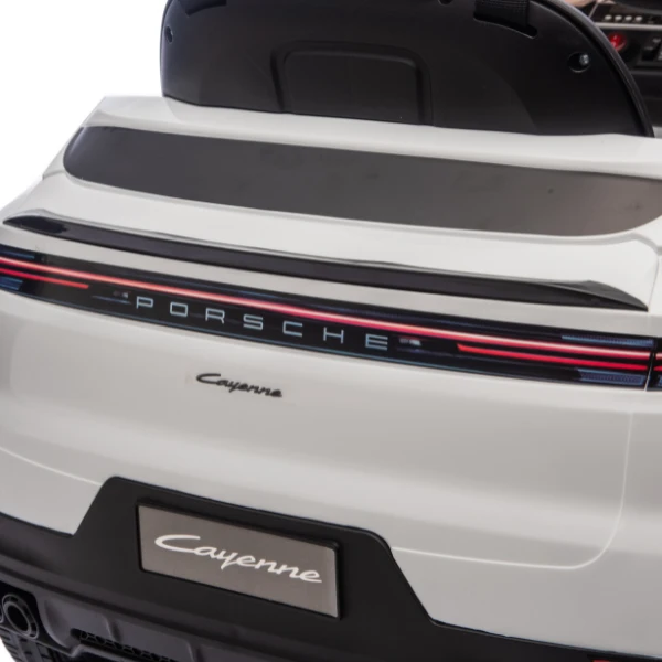 Mașinuță porsche cayenne, baterie 12v7ah, 2 motoare de 25w, roti eva, scaune din piele 19