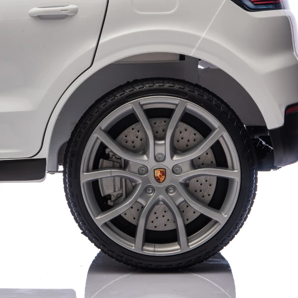 Mașinuță porsche cayenne, baterie 12v7ah, 2 motoare de 25w, roti eva, scaune din piele 16