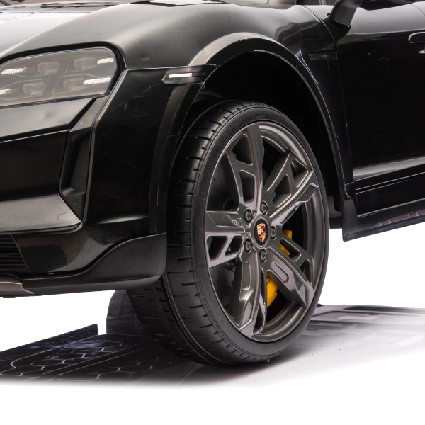 Mașinuță porsche taycan, baterie 12v10ah, 2 motoare de 35w, roti eva, scaune din piele 21