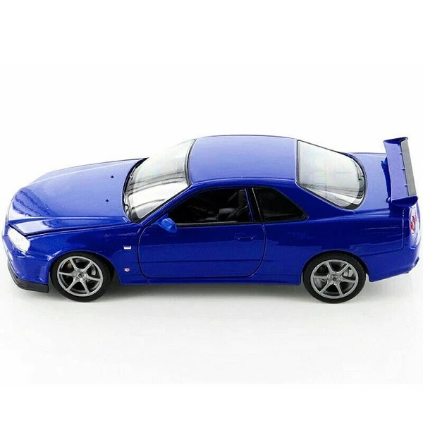 Коллекционный автомобиль die cast nissan skyline gt-r 1:24 welly 5