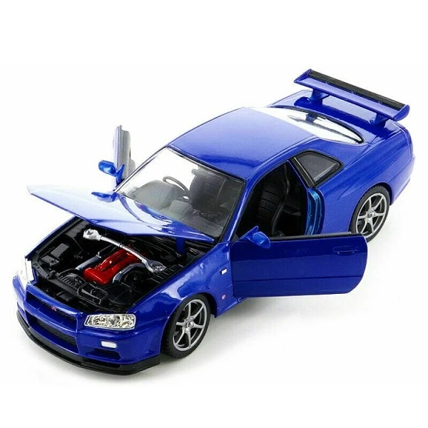 Коллекционный автомобиль die cast nissan skyline gt-r 1:24 welly 6