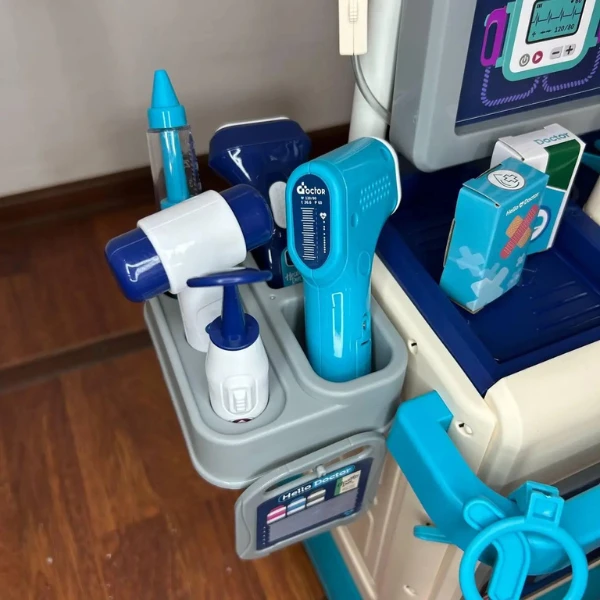 Set de joacă pentru copii „doctor”, masă cu accesorii pe roți 7
